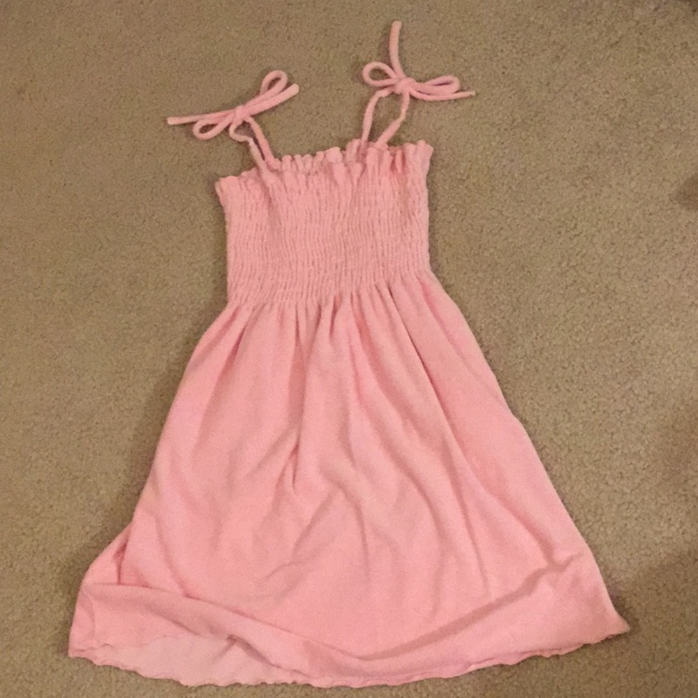 Girls’ pink terrycloth coverup